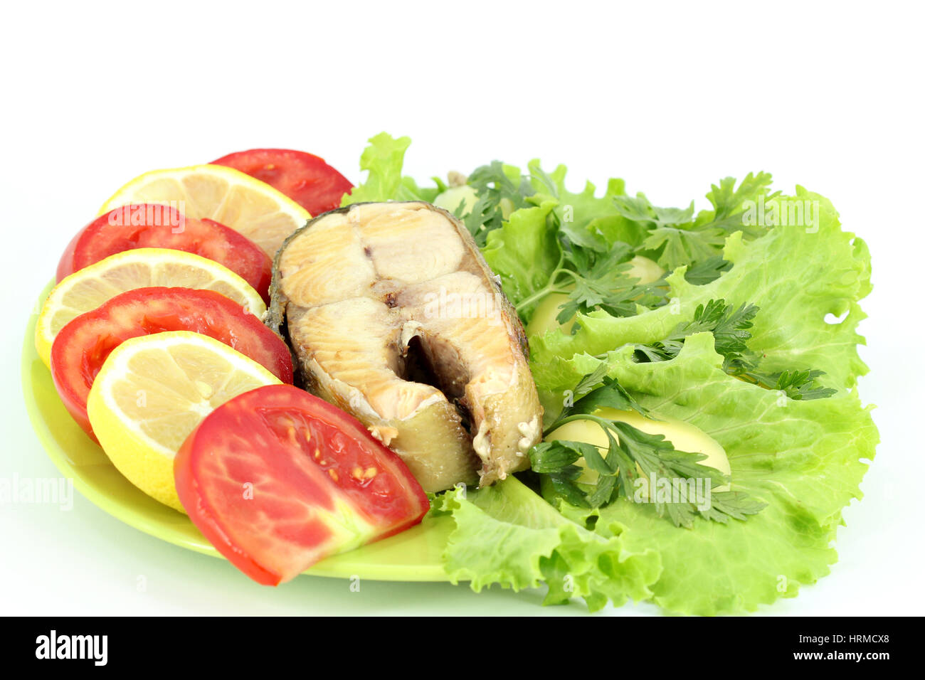salmon with vegetables and salad Stock Photo
