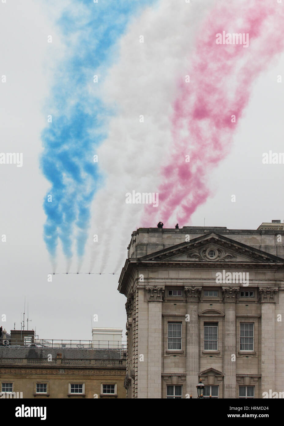 The Royal Air Force Red Arrows fly-over Buckingham Palace for the Queens Birthday Flypast Stock Photo