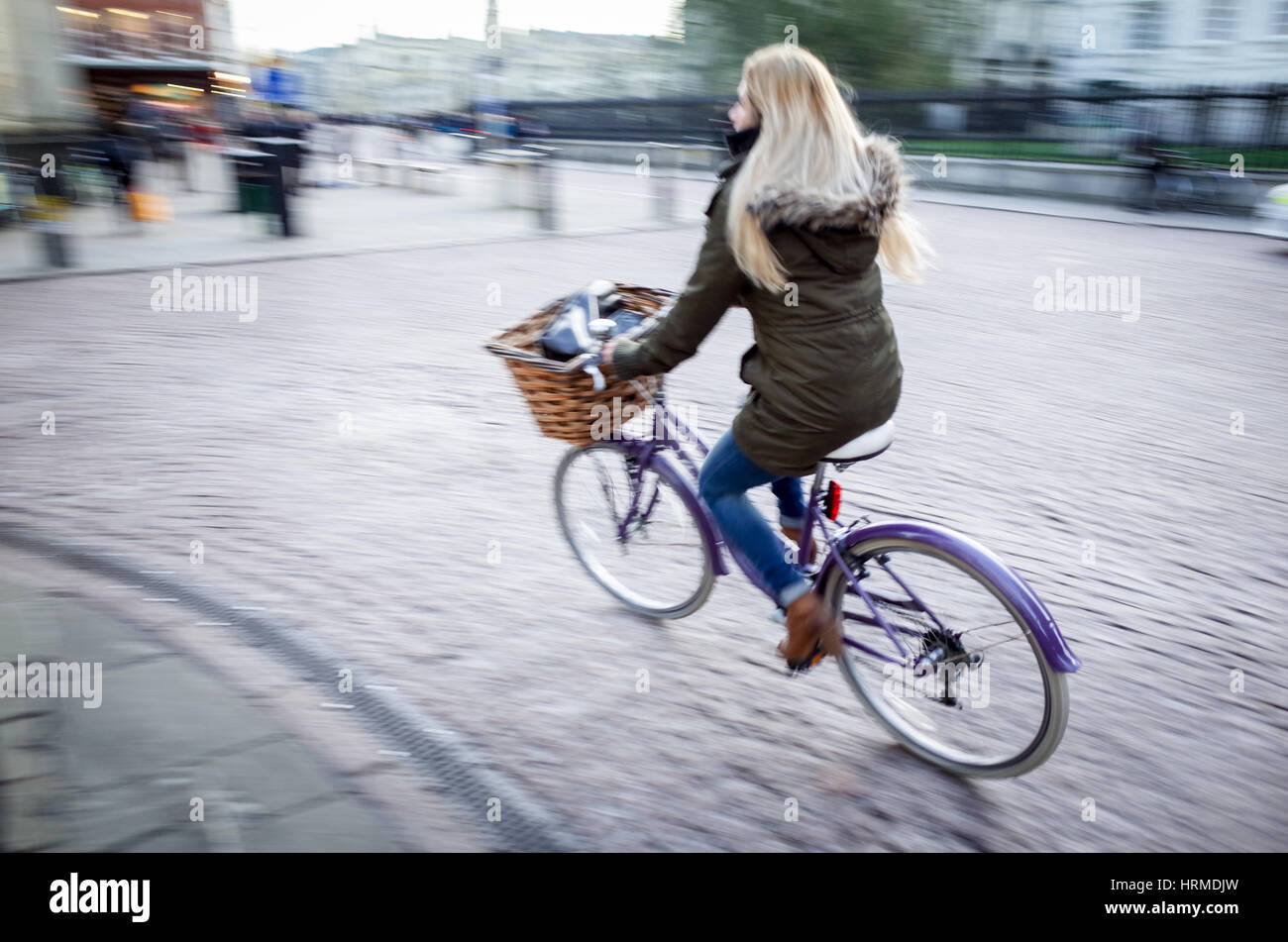 Motion Blur - Commuters cycle through central Cambridge Stock Photo