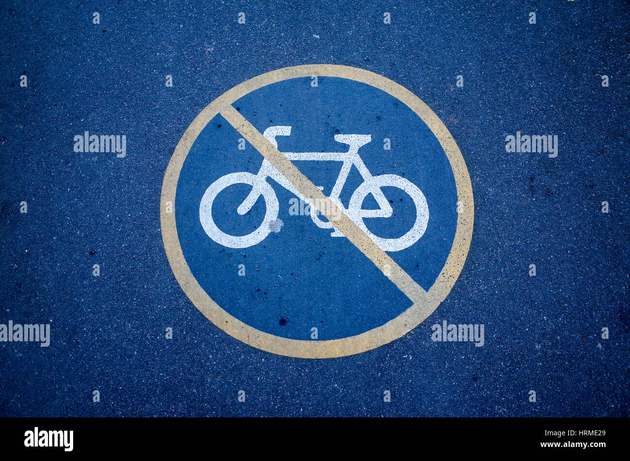 No Cycling Sign - Cycling Forbidden - No Cycling sign on tarmac pavement Stock Photo