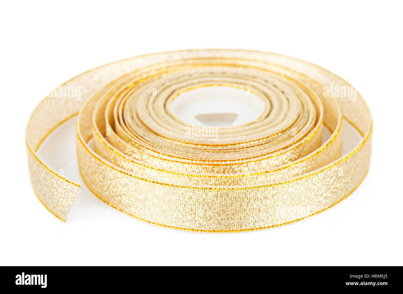 Gold ribbon roll on white background Stock Photo Alamy