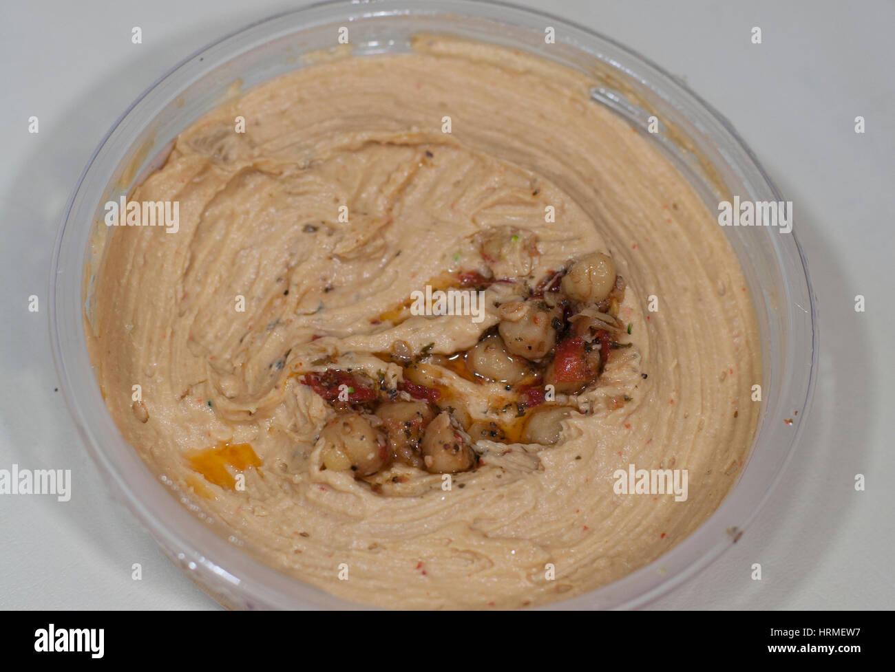 Close up of fresh hummus spread with unmixed garbanzo beans Stock Photo