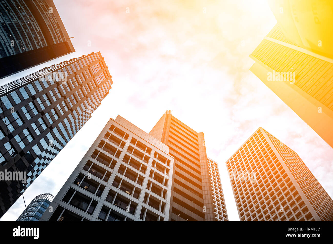 Modern office building close up in sunlight Stock Photo - Alamy