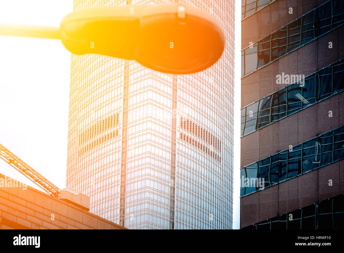 Modern office building close up in sunlight Stock Photo - Alamy