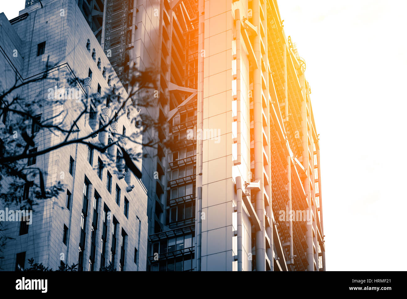 Modern office building close up in sunlight Stock Photo - Alamy