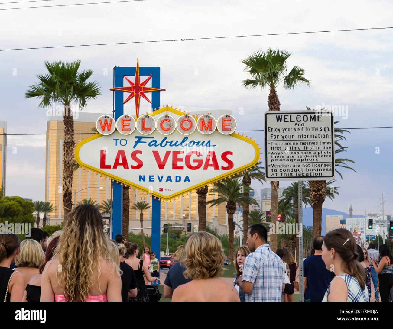 Crowds of tourists are gathering at the 'Welcome to Fabulous Las Vegas' sign, famous landmark at the end of the Las Vegas Boulevard and entry point to Stock Photo