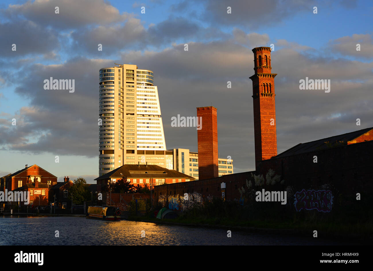 sunset at bridgewater place by victorian factory chimneys leeds united kingdom Stock Photo