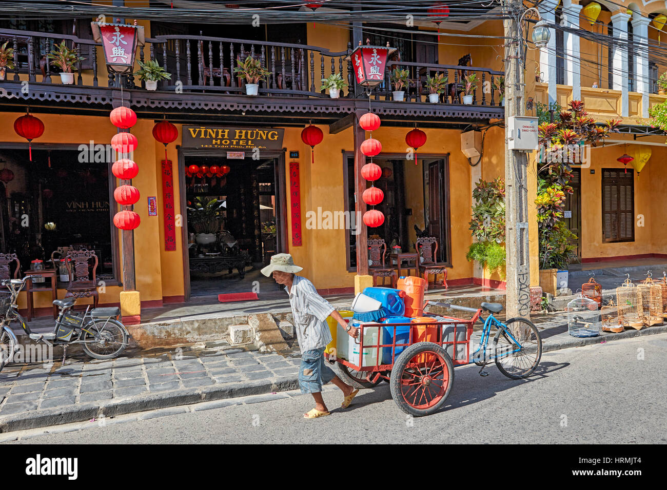 Facade of the Vinh Hung Hotel in Hoi An Ancient Town. Quang Nam Province, Vietnam. Stock Photo