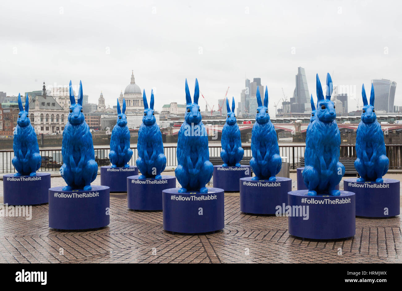 10 six foot statues blue rabbits on londons southbank hi-res stock ...