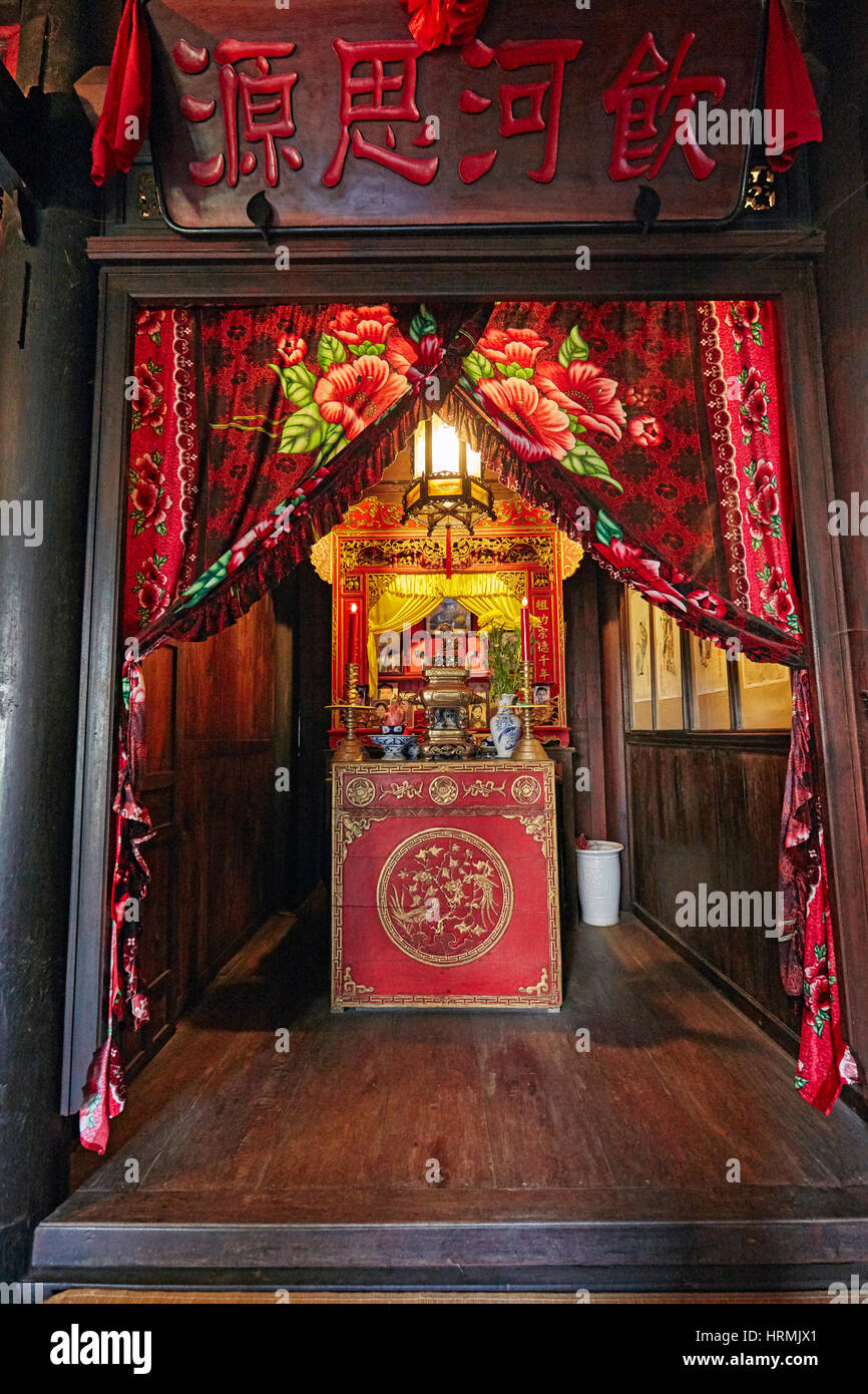 Ancestor altar in the Old House of Duc An. Hoi An Ancient Town, Quang Nam Province, Vietnam. Stock Photo
