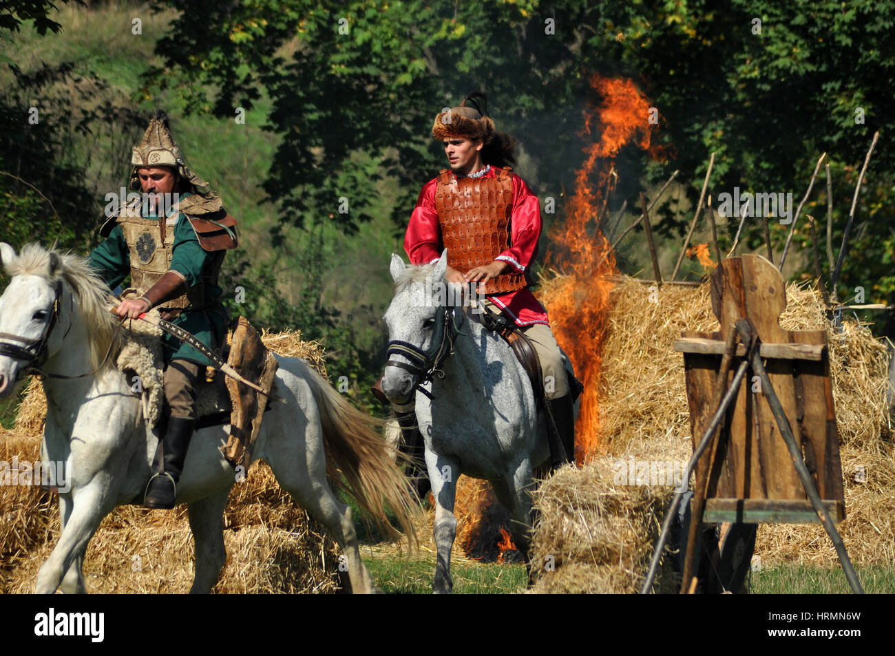 CLUJ-NAPOCA, ROMANIA - OCTOBER 3: Members of Eagles of Calata Nomadic group performing a free equestrian demonstration with Hunnic and archaic Hungari Stock Photo