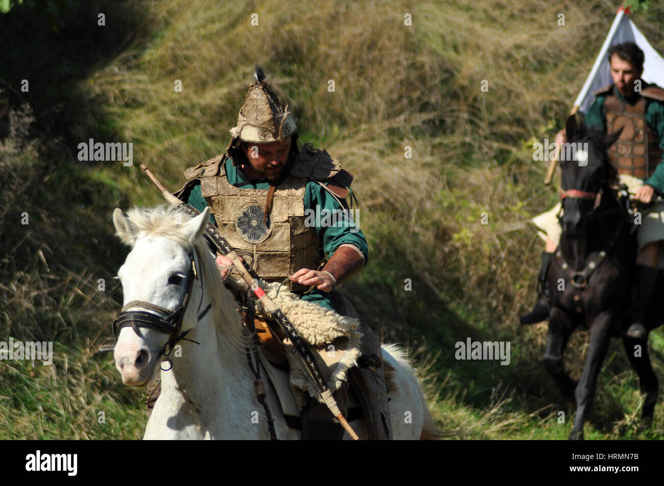 CLUJ-NAPOCA, ROMANIA - OCTOBER 3: Members of Eagles of Calata Nomadic group performing a free equestrian demonstration with Hunnic and archaic Hungari Stock Photo