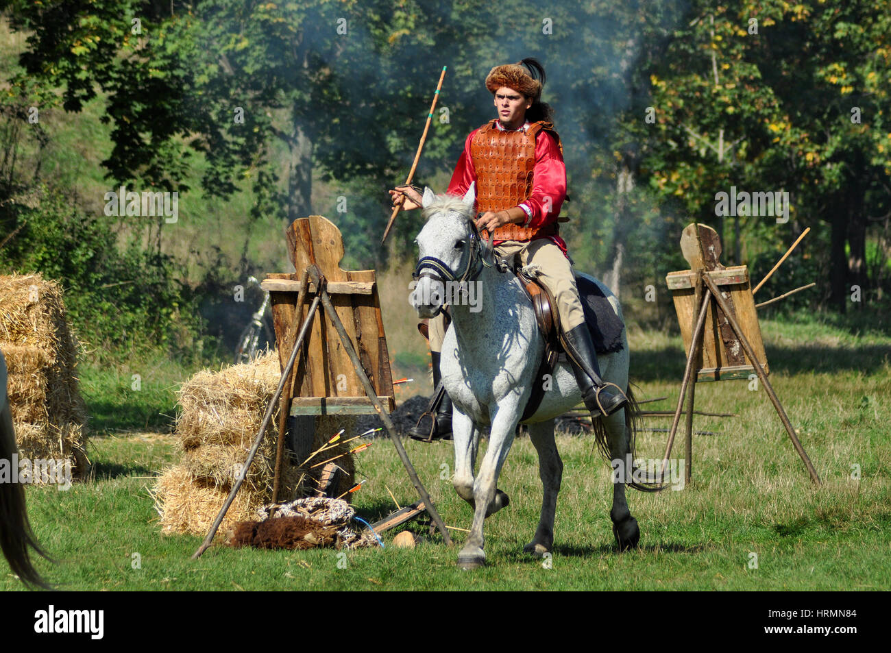 CLUJ-NAPOCA, ROMANIA - OCTOBER 3: Members of Eagles of Calata Nomadic group performing a free equestrian demonstration with Hunnic and archaic Hungari Stock Photo