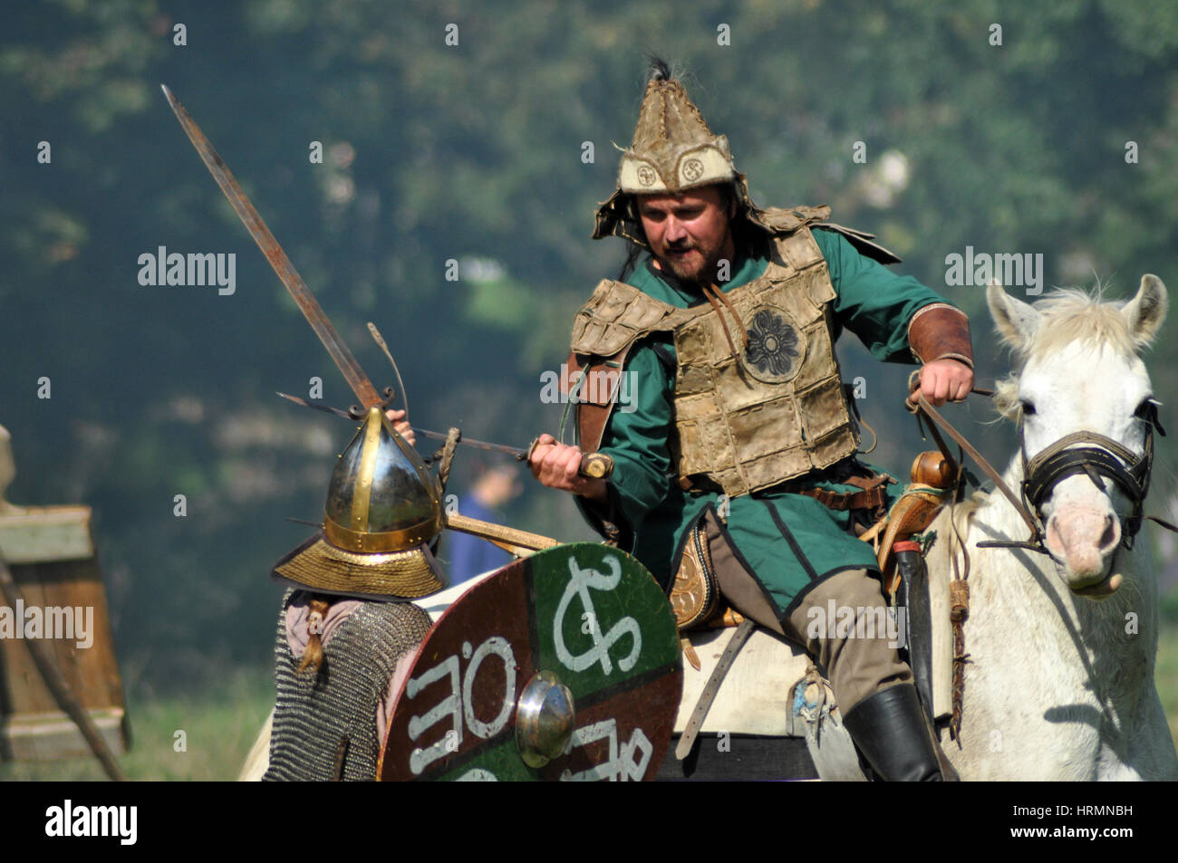 CLUJ-NAPOCA, ROMANIA - OCTOBER 3: Members of Eagles of Calata Nomadic group performing a free equestrian demonstration with Hunnic and archaic Hungari Stock Photo