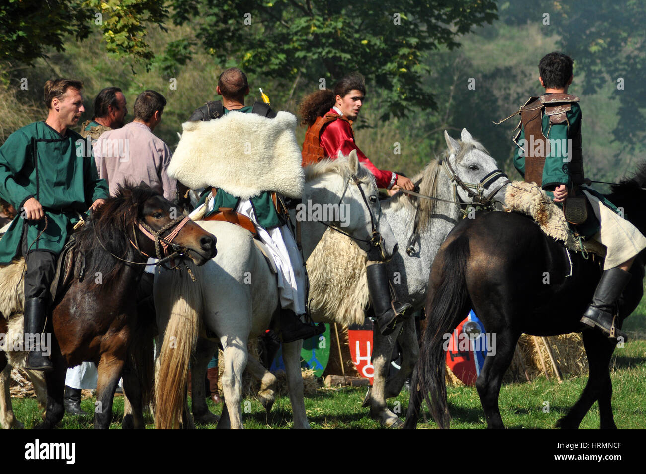 CLUJ-NAPOCA, ROMANIA - OCTOBER 3: Members of Eagles of Calata Nomadic group performing a free equestrian demonstration with Hunnic and archaic Hungari Stock Photo