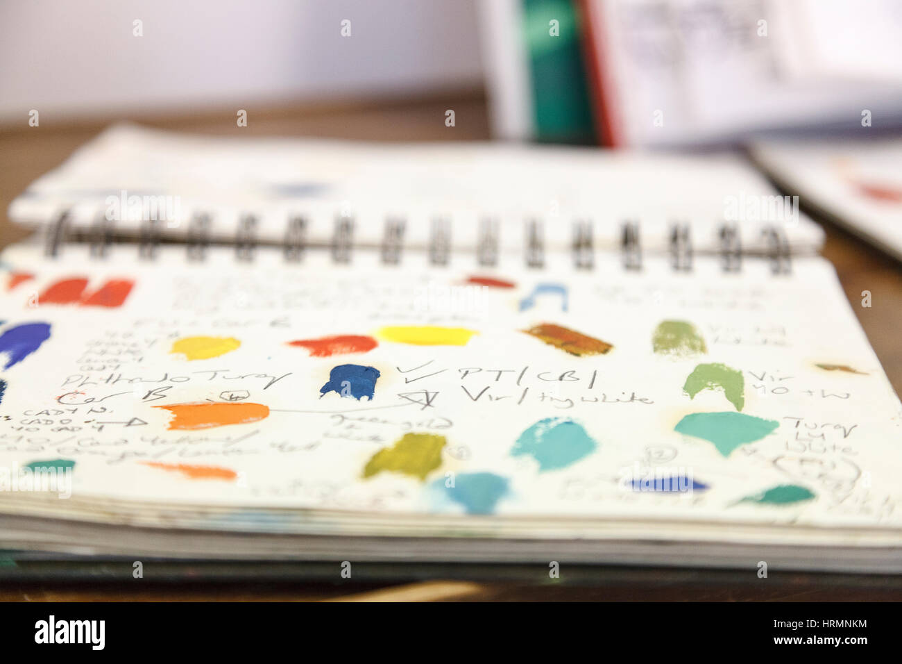 Artist’s open sketchbook with ideas for colours Stock Photo Alamy