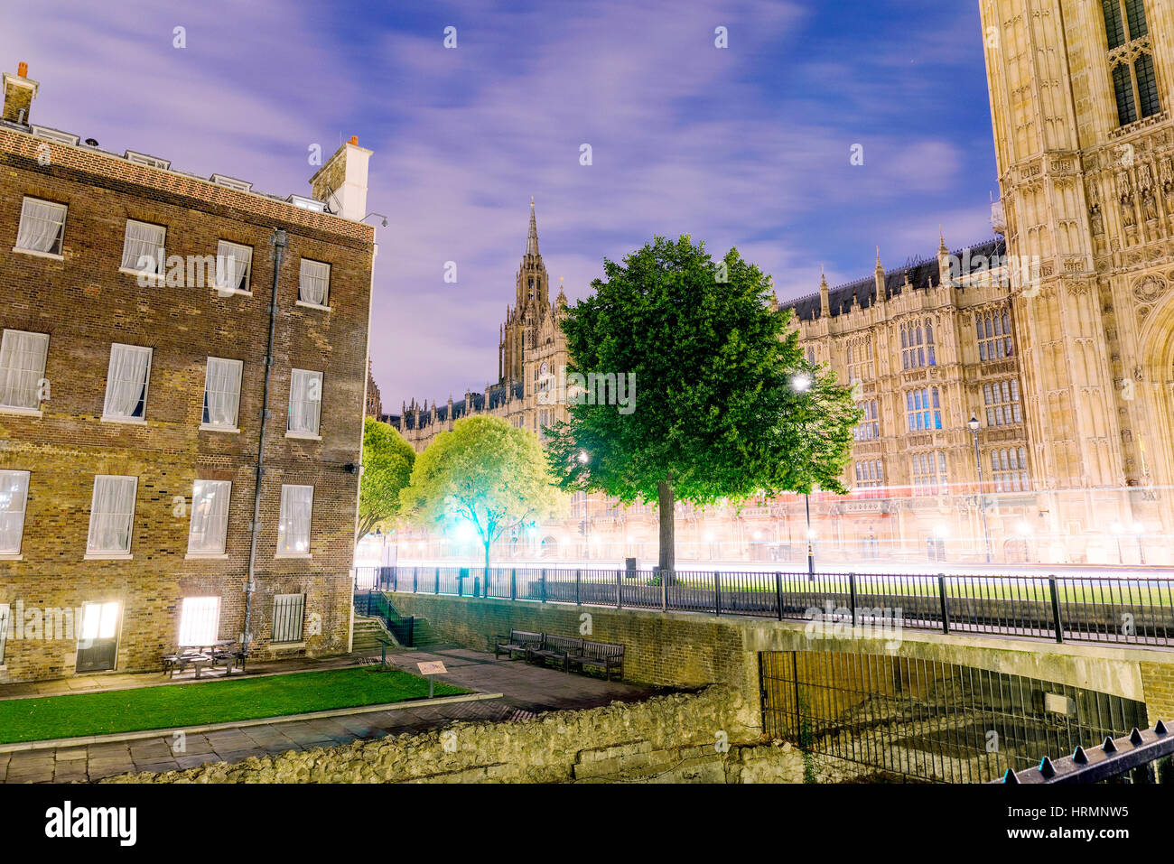 Jewel house and Houses of Parliament at night time Stock Photo