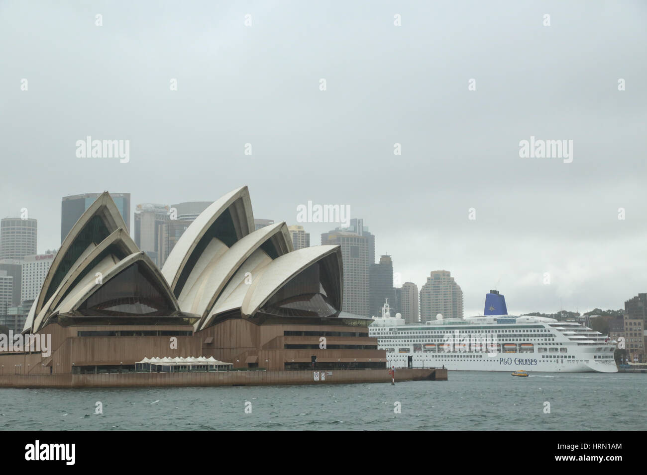 Sydney, Australia. 3rd Mar, 2017. Heavy rain and windy weather affected Sydney. Pictured: Sydney Harbour with the Opera House and the P&O Cruises Aurora cruise ship. Credit: Credit: Richard Milnes/Alamy Live News Stock Photo