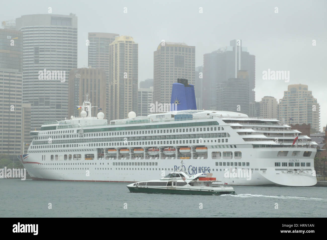 Sydney, Australia. 3rd Mar, 2017. Heavy rain and windy weather affected Sydney. Pictured: Sydney Harbour with the Central Business District (CBD) and the P&O Cruises Aurora cruise ship. Credit: Credit: Richard Milnes/Alamy Live News Stock Photo