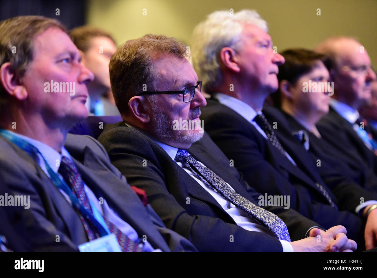 Glasgow, Scotland, UK. 3rd March 2017. David Mundell (2nd L), Secretary of State for Scotland in the UK Government, listens to Theresa May's speech at the Scottish COnservative Party spring conference, Credit: Ken Jack/Alamy Live News Stock Photo