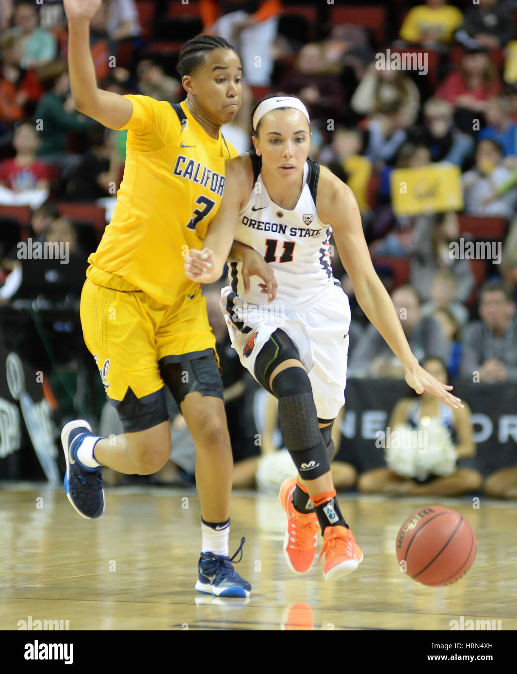 Seattle, WA, USA. 3rd Mar, 2017. Cal's Mikayla Cowling (3) pressures OSU point guard Gabriella Hanson (11) during a PAC12 women's tournament game between the Oregon State Beavers and the Cal Bears. OSU won the game 65-49. The game was played at Key Arena in Seattle, WA. Jeff Halstead/CSM/Alamy Live News Stock Photo