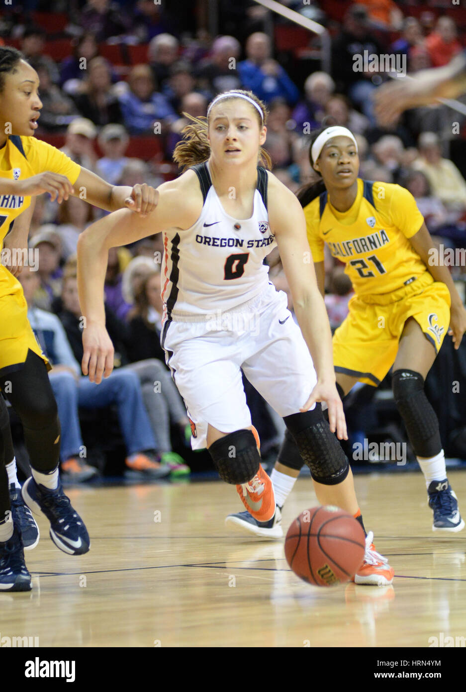 Seattle, WA, USA. 3rd Mar, 2017. OSU's Mikayla Pivec (0) dribbles down the lane against Cal's Jaelyn Brown (33) during a PAC12 women's tournament game between the Oregon State Beavers and the Cal Bears. OSU won the game 65-49. The game was played at Key Arena in Seattle, WA. Jeff Halstead/CSM/Alamy Live News Stock Photo