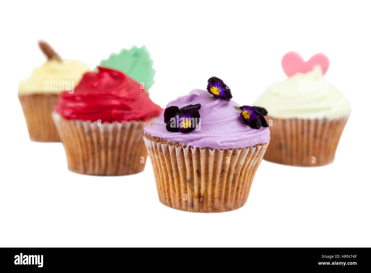 Hand made decorated cupcakes isolated on a white background Stock Photo