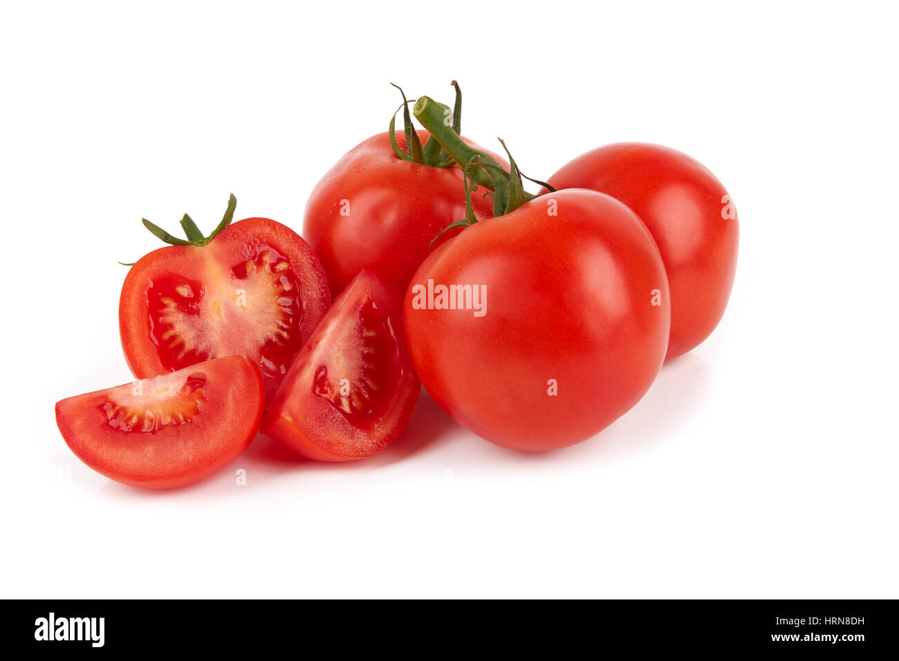 Closeup of tomatoes isolated on the white background Stock Photo - Alamy