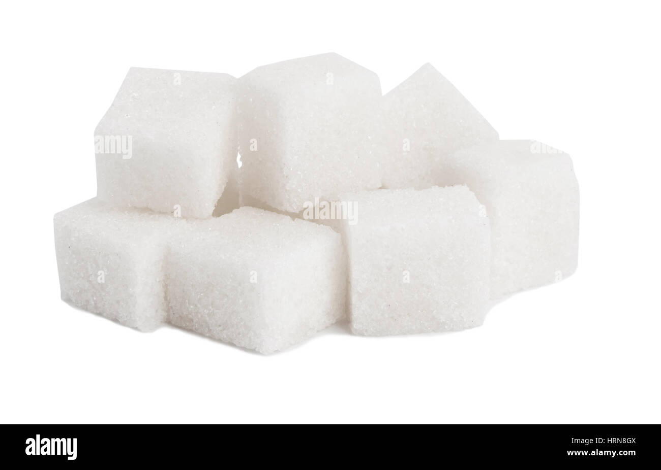 Pile of sugar lumps, isolated on a white background Stock Photo - Alamy