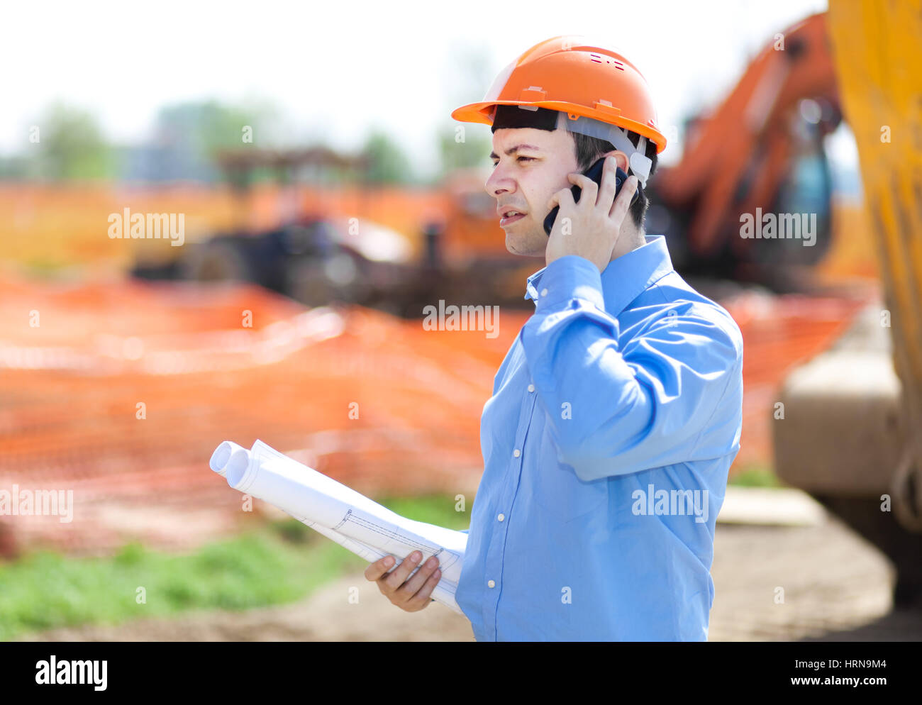 Worker in a construction site Stock Photo - Alamy