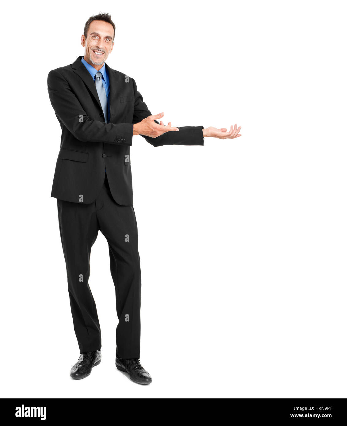Businessman welcoming you on white background Stock Photo - Alamy