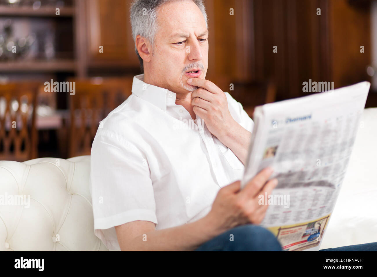 Reading a newspaper 60s hi-res stock photography and images - Alamy