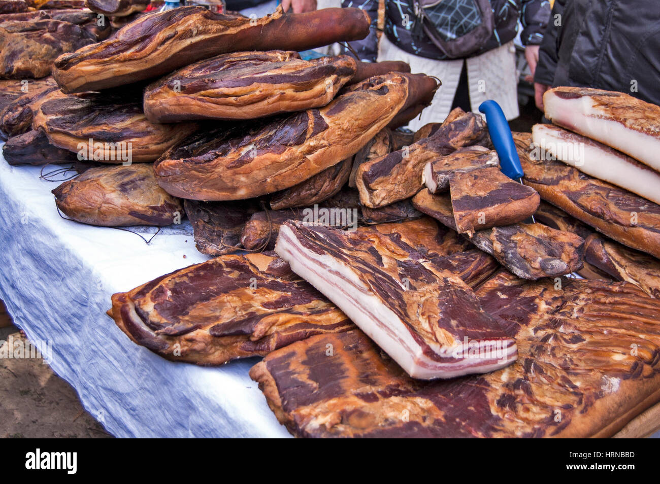 Domestic pork ham and bacon exposed for sale Stock Photo Alamy