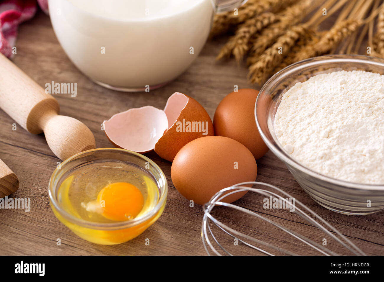 https://c8.alamy.com/comp/HRNDGR/egg-flour-and-baking-supplies-on-the-table-HRNDGR.jpg
