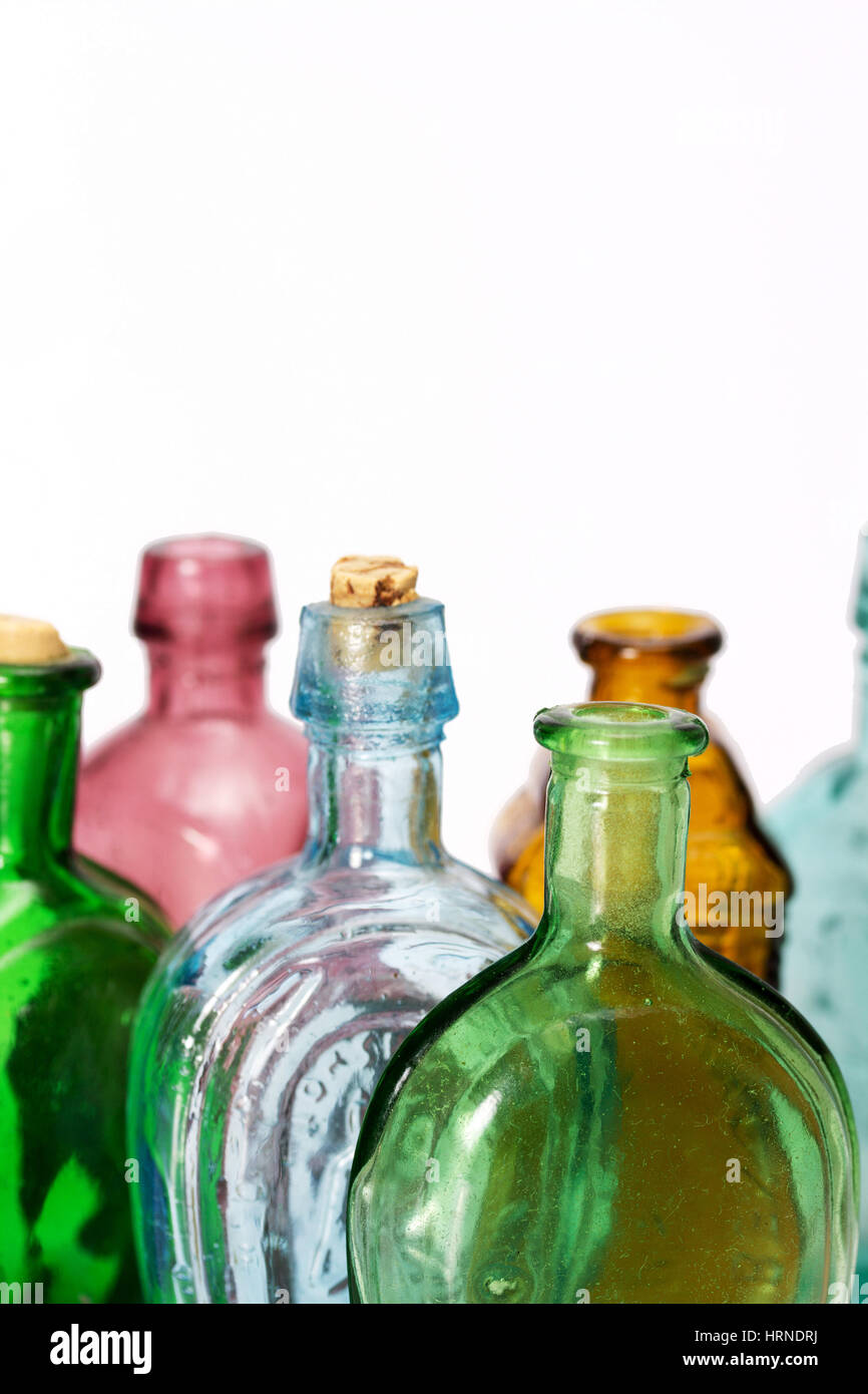 Old colourful vintage bottles against a white background Stock Photo ...
