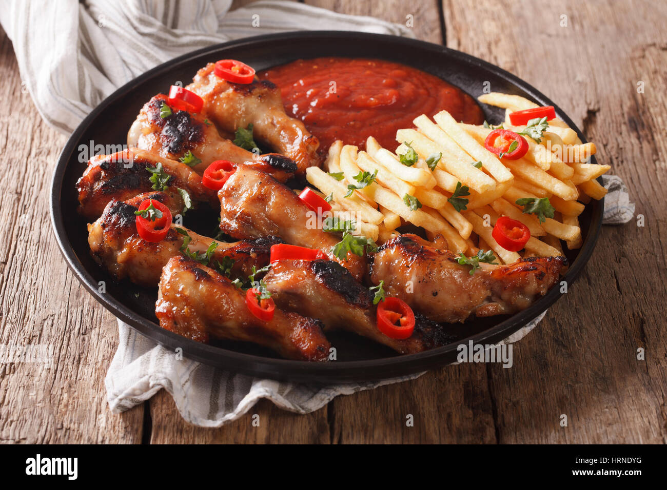 Chicken wings and fries hi-res stock photography and images - Alamy