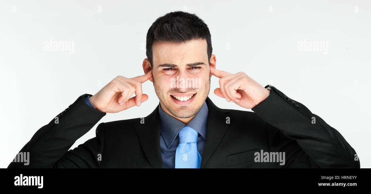 Businessman turning a deaf ear Stock Photo Alamy