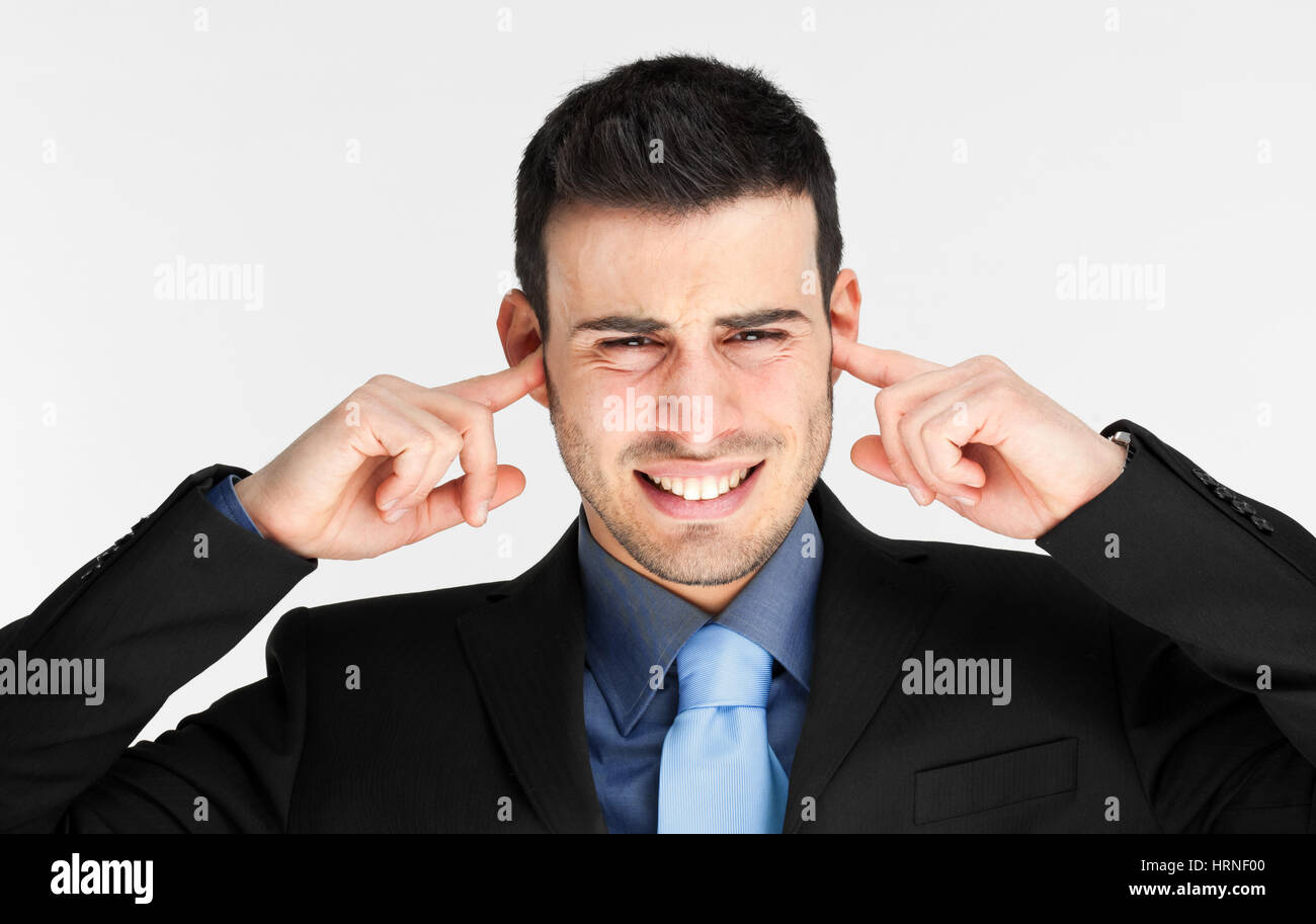Businessman turning a deaf ear Stock Photo Alamy