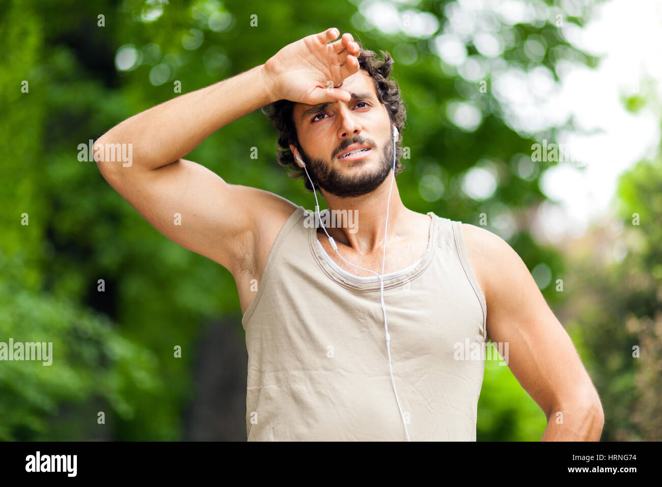 Portrait of a guy doing fitness outdoors Stock Photo