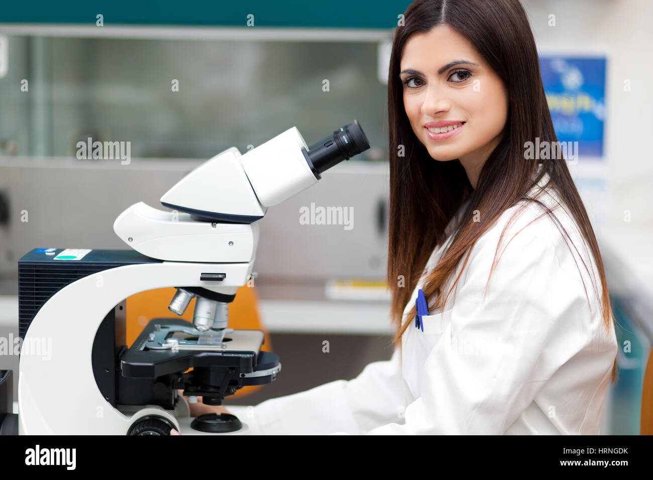 Female researcher working in a laboratory Stock Photo - Alamy