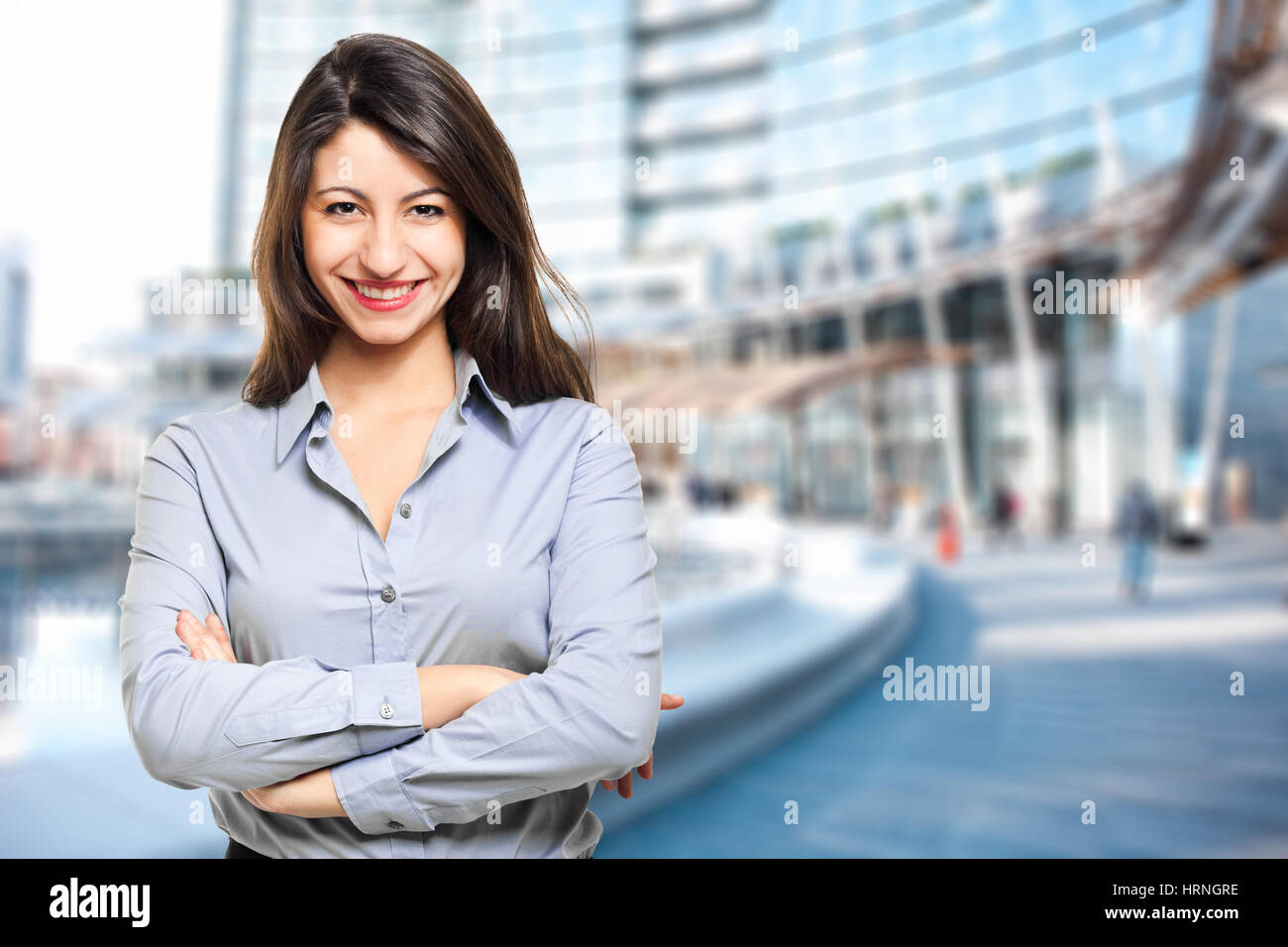 Friendly businesswoman outdoor Stock Photo - Alamy