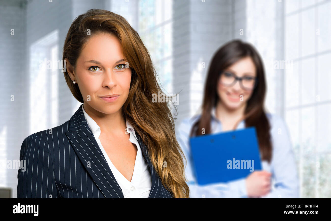 Two businesswomen in an office Stock Photo - Alamy