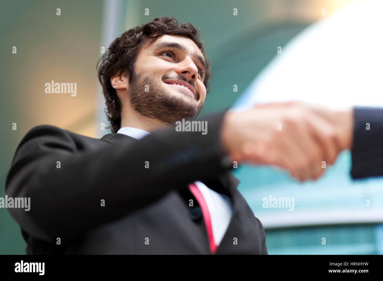Business people handshaking Stock Photo - Alamy
