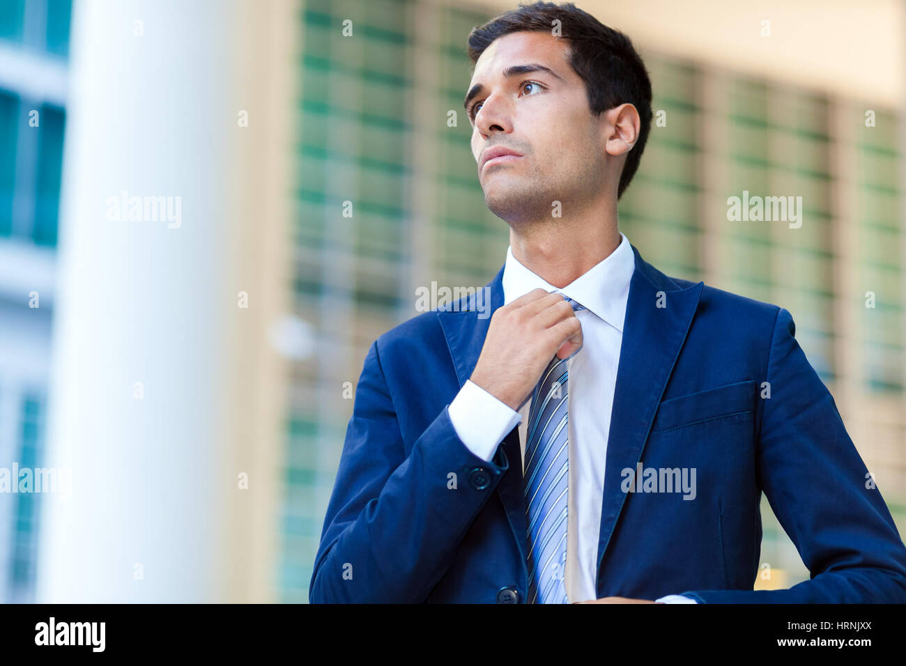 Portrait of an handsome businessman outdoor Stock Photo - Alamy