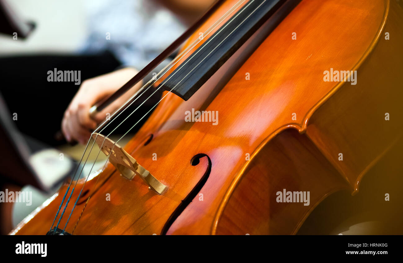 Violoncello scroll music background hi-res stock photography and images ...