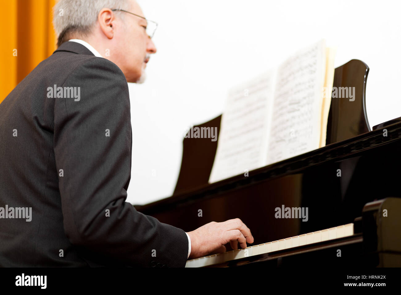 Man playing the piano stock photo alamy