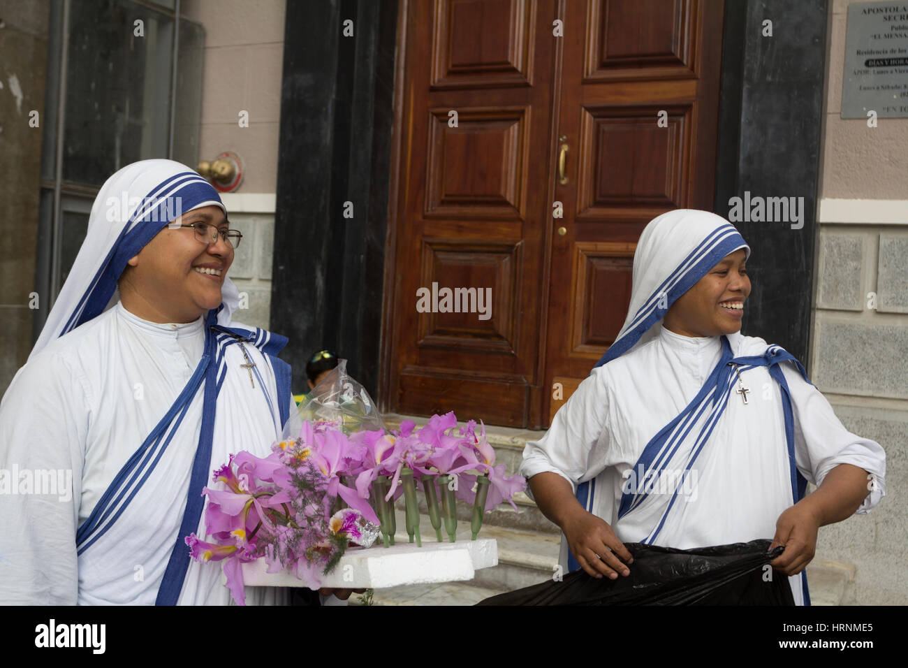 Venezuela Caracas 28/03/2013.Nuns Sisters of charity with orchids during Easter celebration. Stock Photo
