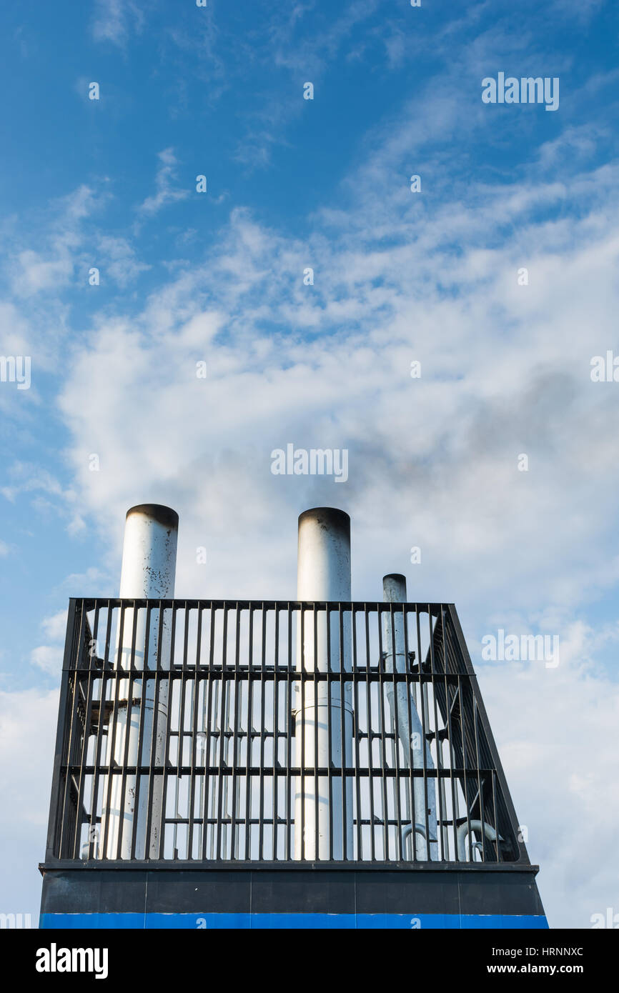 Aboard, chimney of a ferry or cruise ship, black smoke. Pollutes the ...