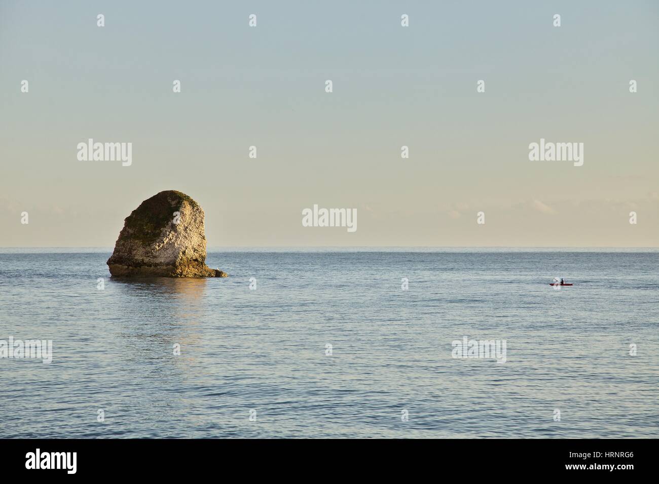 The rock at Freshwater Bay, Isle of Wight with kayak approaching Stock Photo