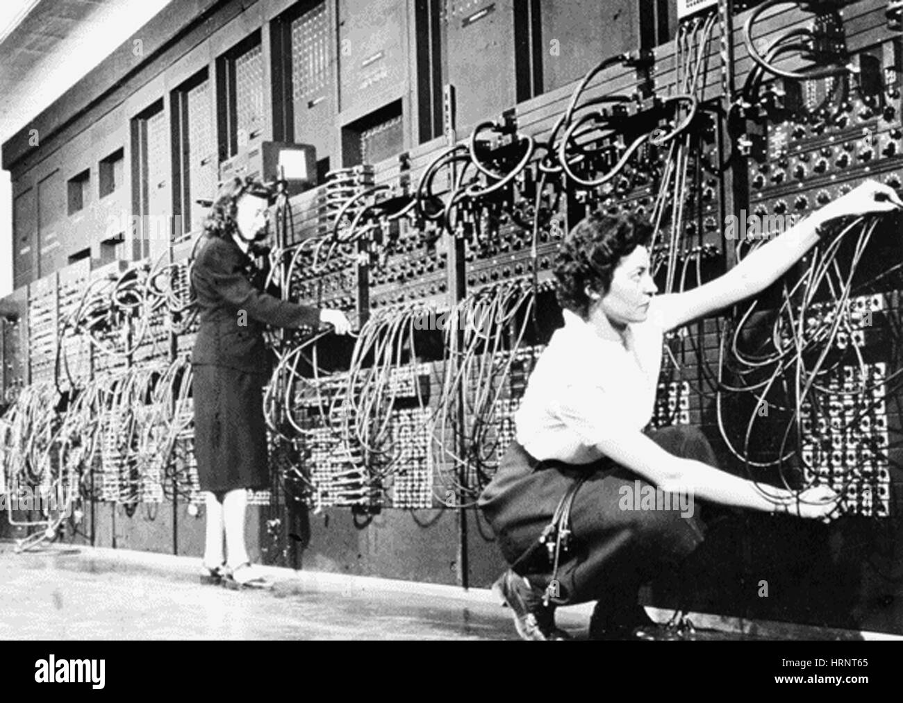 Technicians Connecting Wires of ENIAC Stock Photo